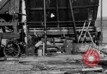 Image of "Shooting" an oil well with nitroglycerin United States USA, 1925, second 11 stock footage video 65675050483