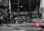 Image of "Shooting" an oil well with nitroglycerin United States USA, 1925, second 12 stock footage video 65675050483