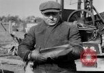 Image of "Shooting" an oil well with nitroglycerin United States USA, 1925, second 17 stock footage video 65675050483