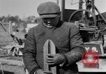 Image of "Shooting" an oil well with nitroglycerin United States USA, 1925, second 18 stock footage video 65675050483