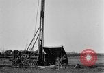Image of "Shooting" an oil well with nitroglycerin United States USA, 1925, second 28 stock footage video 65675050483