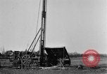 Image of "Shooting" an oil well with nitroglycerin United States USA, 1925, second 29 stock footage video 65675050483
