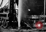 Image of "Shooting" an oil well with nitroglycerin United States USA, 1925, second 32 stock footage video 65675050483