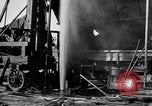 Image of "Shooting" an oil well with nitroglycerin United States USA, 1925, second 34 stock footage video 65675050483
