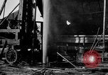 Image of "Shooting" an oil well with nitroglycerin United States USA, 1925, second 36 stock footage video 65675050483