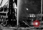 Image of "Shooting" an oil well with nitroglycerin United States USA, 1925, second 37 stock footage video 65675050483