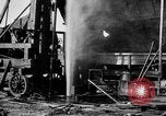 Image of "Shooting" an oil well with nitroglycerin United States USA, 1925, second 38 stock footage video 65675050483