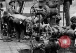Image of "Shooting" an oil well with nitroglycerin United States USA, 1925, second 47 stock footage video 65675050483