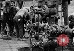Image of "Shooting" an oil well with nitroglycerin United States USA, 1925, second 51 stock footage video 65675050483
