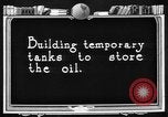 Image of "Shooting" an oil well with nitroglycerin United States USA, 1925, second 55 stock footage video 65675050483