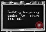 Image of "Shooting" an oil well with nitroglycerin United States USA, 1925, second 57 stock footage video 65675050483