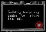 Image of "Shooting" an oil well with nitroglycerin United States USA, 1925, second 60 stock footage video 65675050483
