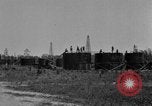 Image of "Shooting" an oil well with nitroglycerin United States USA, 1925, second 61 stock footage video 65675050483