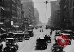 Image of Busy city street with traffic circa 1925 United States USA, 1925, second 14 stock footage video 65675050488