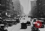 Image of Busy city street with traffic circa 1925 United States USA, 1925, second 15 stock footage video 65675050488