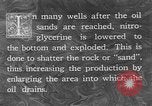 Image of pumping of oil United States USA, 1923, second 53 stock footage video 65675050547