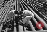Image of oil pumping station Iran, 1951, second 11 stock footage video 65675050593