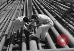 Image of oil pumping station Iran, 1951, second 12 stock footage video 65675050593