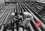 Image of oil pumping station Iran, 1951, second 14 stock footage video 65675050593