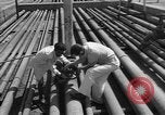 Image of oil pumping station Iran, 1951, second 16 stock footage video 65675050593