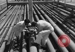 Image of oil pumping station Iran, 1951, second 17 stock footage video 65675050593