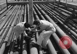 Image of oil pumping station Iran, 1951, second 18 stock footage video 65675050593