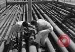 Image of oil pumping station Iran, 1951, second 19 stock footage video 65675050593