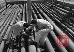 Image of oil pumping station Iran, 1951, second 20 stock footage video 65675050593