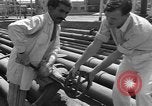 Image of oil pumping station Iran, 1951, second 22 stock footage video 65675050593