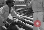 Image of oil pumping station Iran, 1951, second 25 stock footage video 65675050593