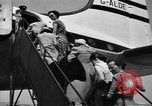 Image of British nationals board aircraft Iran, 1951, second 6 stock footage video 65675050594