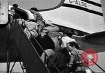 Image of British nationals board aircraft Iran, 1951, second 7 stock footage video 65675050594