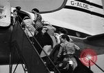 Image of British nationals board aircraft Iran, 1951, second 9 stock footage video 65675050594