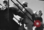 Image of British nationals board aircraft Iran, 1951, second 15 stock footage video 65675050594