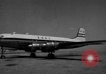 Image of British nationals board aircraft Iran, 1951, second 55 stock footage video 65675050594