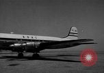 Image of British nationals board aircraft Iran, 1951, second 56 stock footage video 65675050594