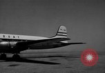 Image of British nationals board aircraft Iran, 1951, second 57 stock footage video 65675050594