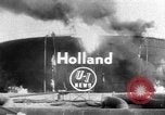 Image of oil fire Rotterdam Netherlands, 1954, second 1 stock footage video 65675050606