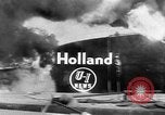 Image of oil fire Rotterdam Netherlands, 1954, second 4 stock footage video 65675050606