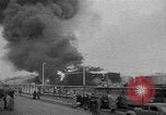Image of oil fire Rotterdam Netherlands, 1954, second 8 stock footage video 65675050606