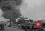 Image of oil fire Rotterdam Netherlands, 1954, second 9 stock footage video 65675050606