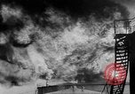 Image of oil fire Rotterdam Netherlands, 1954, second 12 stock footage video 65675050606