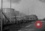 Image of oil fire Rotterdam Netherlands, 1954, second 17 stock footage video 65675050606