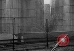 Image of oil fire Rotterdam Netherlands, 1954, second 19 stock footage video 65675050606