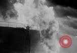 Image of oil fire Rotterdam Netherlands, 1954, second 21 stock footage video 65675050606