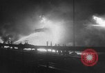 Image of oil fire Rotterdam Netherlands, 1954, second 27 stock footage video 65675050606