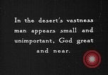 Image of caravan caught in a sand storm in desert of Saudi Arabia Saudi Arabia, 1936, second 37 stock footage video 65675050625