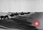 Image of caravan caught in a sand storm in desert of Saudi Arabia Saudi Arabia, 1936, second 61 stock footage video 65675050625
