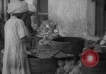 Image of shelling and drying of coconut Caracas Venezuela, 1940, second 5 stock footage video 65675050637