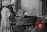 Image of shelling and drying of coconut Caracas Venezuela, 1940, second 6 stock footage video 65675050637